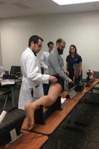 Residents participating in a spasticity workshop 
